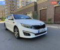 Белый Киа Оптима, объемом двигателя 2.36 л и пробегом 205 тыс. км за 11500 $, фото 1 на Automoto.ua
