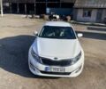 Белый Киа Оптима, объемом двигателя 2.36 л и пробегом 145 тыс. км за 9300 $, фото 1 на Automoto.ua