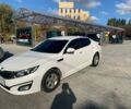 Білий Кіа Оптіма, об'ємом двигуна 2 л та пробігом 128 тис. км за 12600 $, фото 1 на Automoto.ua