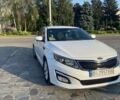 Білий Кіа Оптіма, об'ємом двигуна 2.4 л та пробігом 146 тис. км за 9399 $, фото 1 на Automoto.ua