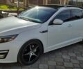 Білий Кіа Оптіма, об'ємом двигуна 2 л та пробігом 127 тис. км за 11900 $, фото 1 на Automoto.ua