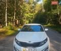 Белый Киа Оптима, объемом двигателя 1.7 л и пробегом 210 тыс. км за 10000 $, фото 1 на Automoto.ua