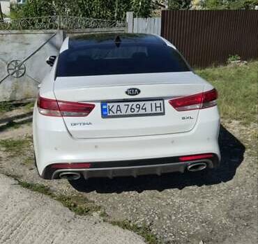 Білий Кіа Оптіма, об'ємом двигуна 2 л та пробігом 173 тис. км за 13000 $, фото 2 на Automoto.ua