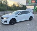 Білий Кіа Оптіма, об'ємом двигуна 2.36 л та пробігом 130 тис. км за 8700 $, фото 1 на Automoto.ua