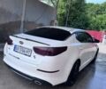 Белый Киа Оптима, объемом двигателя 2 л и пробегом 290 тыс. км за 9150 $, фото 1 на Automoto.ua