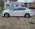 Белый Киа Оптима, объемом двигателя 2.36 л и пробегом 217 тыс. км за 9500 $, фото 2 на Automoto.ua