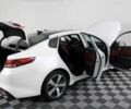 Белый Киа Оптима, объемом двигателя 2 л и пробегом 66 тыс. км за 10500 $, фото 1 на Automoto.ua