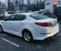 Білий Кіа Оптіма, об'ємом двигуна 2.36 л та пробігом 135 тис. км за 8800 $, фото 12 на Automoto.ua