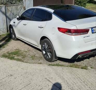Білий Кіа Оптіма, об'ємом двигуна 2 л та пробігом 173 тис. км за 13000 $, фото 1 на Automoto.ua