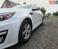Білий Кіа Оптіма, об'ємом двигуна 2.36 л та пробігом 240 тис. км за 8200 $, фото 4 на Automoto.ua