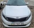 Білий Кіа Оптіма, об'ємом двигуна 2.36 л та пробігом 235 тис. км за 8990 $, фото 1 на Automoto.ua