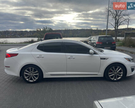 Білий Кіа Оптіма, об'ємом двигуна 2 л та пробігом 173 тис. км за 12800 $, фото 4 на Automoto.ua