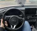Белый Киа Оптима, объемом двигателя 2 л и пробегом 267 тыс. км за 11200 $, фото 1 на Automoto.ua