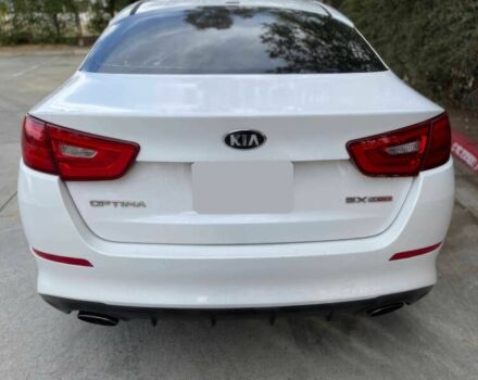 Белый Киа Оптима, объемом двигателя 2 л и пробегом 77 тыс. км за 6500 $, фото 6 на Automoto.ua