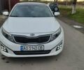 Белый Киа Оптима, объемом двигателя 1.69 л и пробегом 225 тыс. км за 10300 $, фото 1 на Automoto.ua