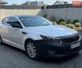 Білий Кіа Оптіма, об'ємом двигуна 2.36 л та пробігом 220 тис. км за 7300 $, фото 1 на Automoto.ua