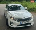 Белый Киа Оптима, объемом двигателя 2.36 л и пробегом 208 тыс. км за 10499 $, фото 2 на Automoto.ua