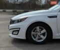Білий Кіа Оптіма, об'ємом двигуна 2.4 л та пробігом 208 тис. км за 8800 $, фото 6 на Automoto.ua