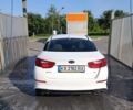 Белый Киа Оптима, объемом двигателя 2.36 л и пробегом 127 тыс. км за 9800 $, фото 3 на Automoto.ua