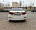 Белый Киа Оптима, объемом двигателя 2 л и пробегом 350 тыс. км за 10100 $, фото 4 на Automoto.ua
