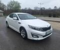 Белый Киа Оптима, объемом двигателя 2 л и пробегом 230 тыс. км за 7800 $, фото 1 на Automoto.ua