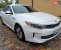 Білий Кіа Оптіма, об'ємом двигуна 2 л та пробігом 140 тис. км за 13500 $, фото 4 на Automoto.ua