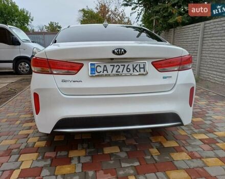 Білий Кіа Оптіма, об'ємом двигуна 2 л та пробігом 140 тис. км за 13500 $, фото 5 на Automoto.ua