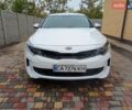 Білий Кіа Оптіма, об'ємом двигуна 2 л та пробігом 140 тис. км за 12000 $, фото 1 на Automoto.ua