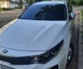 Белый Киа Оптима, объемом двигателя 2 л и пробегом 207 тыс. км за 12700 $, фото 1 на Automoto.ua