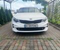 Білий Кіа Оптіма, об'ємом двигуна 2.36 л та пробігом 141 тис. км за 10500 $, фото 1 на Automoto.ua
