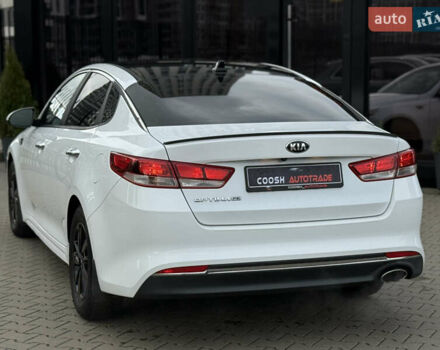 Белый Киа Оптима, объемом двигателя 2.36 л и пробегом 100 тыс. км за 9900 $, фото 7 на Automoto.ua