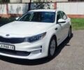 Белый Киа Оптима, объемом двигателя 2.4 л и пробегом 150 тыс. км за 12300 $, фото 1 на Automoto.ua