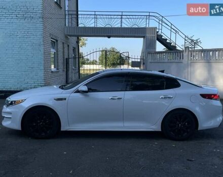 Білий Кіа Оптіма, об'ємом двигуна 2.36 л та пробігом 211 тис. км за 11450 $, фото 3 на Automoto.ua