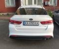 Білий Кіа Оптіма, об'ємом двигуна 1.6 л та пробігом 107 тис. км за 11900 $, фото 1 на Automoto.ua