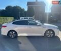 Білий Кіа Оптіма, об'ємом двигуна 2 л та пробігом 120 тис. км за 13800 $, фото 3 на Automoto.ua