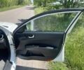Білий Кіа Оптіма, об'ємом двигуна 1.7 л та пробігом 141 тис. км за 12000 $, фото 15 на Automoto.ua