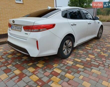 Білий Кіа Оптіма, об'ємом двигуна 2 л та пробігом 140 тис. км за 13500 $, фото 7 на Automoto.ua