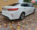 Білий Кіа Оптіма, об'ємом двигуна 2 л та пробігом 140 тис. км за 13500 $, фото 7 на Automoto.ua