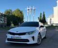 Білий Кіа Оптіма, об'ємом двигуна 2.4 л та пробігом 100 тис. км за 12500 $, фото 1 на Automoto.ua