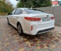 Білий Кіа Оптіма, об'ємом двигуна 2 л та пробігом 140 тис. км за 13500 $, фото 6 на Automoto.ua