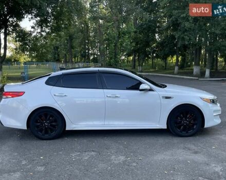 Білий Кіа Оптіма, об'ємом двигуна 2.36 л та пробігом 211 тис. км за 11800 $, фото 8 на Automoto.ua
