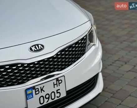 Белый Киа Оптима, объемом двигателя 2.36 л и пробегом 110 тыс. км за 12500 $, фото 2 на Automoto.ua