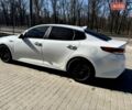 Білий Кіа Оптіма, об'ємом двигуна 2.36 л та пробігом 142 тис. км за 10000 $, фото 6 на Automoto.ua