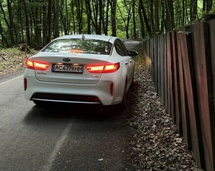 Білий Кіа Оптіма, об'ємом двигуна 2 л та пробігом 210 тис. км за 317 $, фото 2 на Automoto.ua
