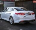 Білий Кіа Оптіма, об'ємом двигуна 2.36 л та пробігом 115 тис. км за 12000 $, фото 5 на Automoto.ua