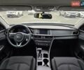 Білий Кіа Оптіма, об'ємом двигуна 2.36 л та пробігом 197 тис. км за 11000 $, фото 8 на Automoto.ua