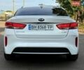 Білий Кіа Оптіма, об'ємом двигуна 2 л та пробігом 200 тис. км за 12700 $, фото 5 на Automoto.ua