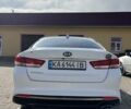 Білий Кіа Оптіма, об'ємом двигуна 2.4 л та пробігом 158 тис. км за 11000 $, фото 4 на Automoto.ua