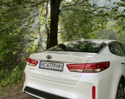 Білий Кіа Оптіма, об'ємом двигуна 2 л та пробігом 210 тис. км за 317 $, фото 6 на Automoto.ua