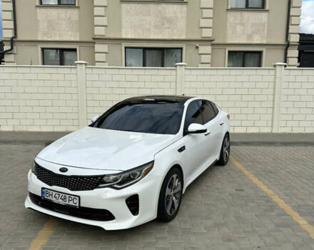 Білий Кіа Оптіма, об'ємом двигуна 2 л та пробігом 80 тис. км за 15900 $, фото 2 на Automoto.ua